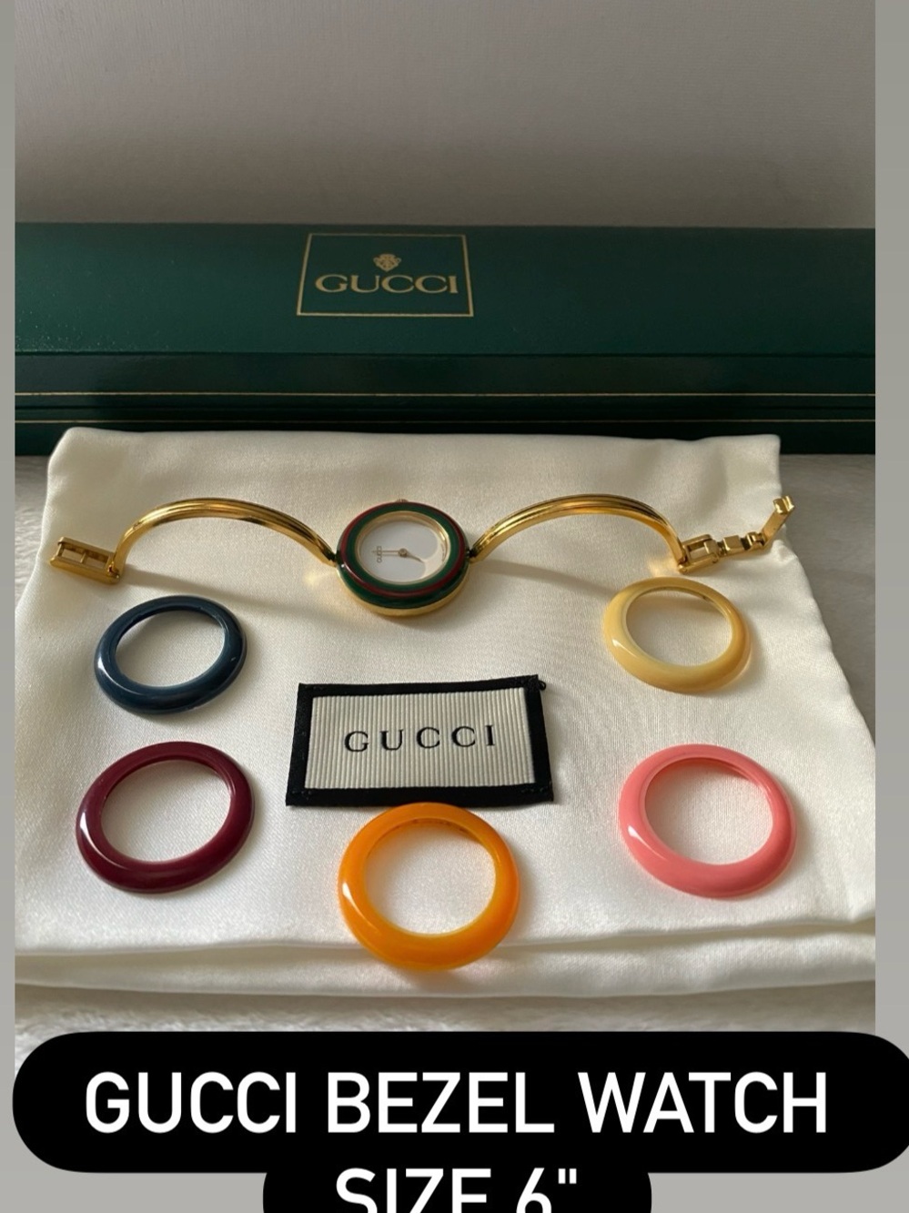 Gucci Gold Bracelet Watch with Interchangeable Colored Bezels